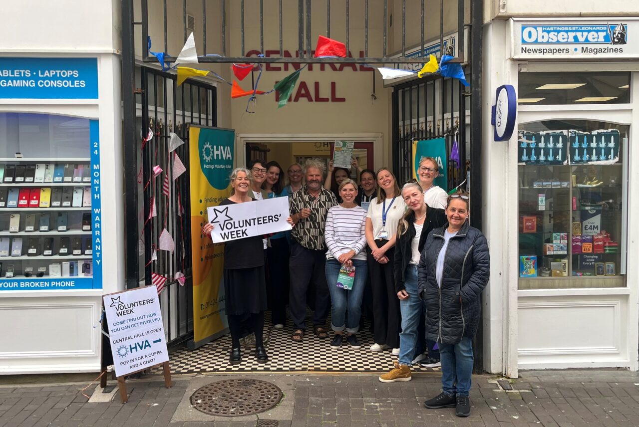 A group of people standing outside Central Hall during Volunteers Week 2025